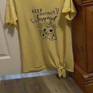 used tee shirts cuff on sleeve and very comfortable knot at the bottom